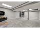 Expansive finished basement with recessed lighting, bar area, and neutral carpeting at 945 Baywood Ct, Columbus, IN 47201
