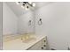 Neutral bathroom featuring a large mirror, gold-toned faucet, and minimalist design at 945 Baywood Ct, Columbus, IN 47201