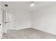 Bedroom with soft carpet, a ceiling fan, and an ensuite bathroom at 945 Baywood Ct, Columbus, IN 47201