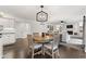 Bright dining area with an open layout leading to the living room and kitchen at 945 Baywood Ct, Columbus, IN 47201