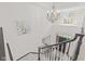 Foyer view from above showcasing the chandelier, staircase, and front door at 945 Baywood Ct, Columbus, IN 47201
