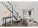 Elegant foyer with hardwood floors, staircase, and view to the living room at 945 Baywood Ct, Columbus, IN 47201
