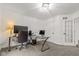 Bright office space with a glass desk, natural light, and neutral colors at 945 Baywood Ct, Columbus, IN 47201