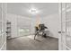 Home office with natural light from the large window at 945 Baywood Ct, Columbus, IN 47201