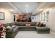 Basement with a large sectional sofa and a kitchenette area, great for entertaining at 9838 Gulfstream Ct, Fishers, IN 46037
