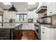 Gourmet kitchen features stainless steel appliances, granite countertops, and a skylight at 10605 Winterwood, Carmel, IN 46032