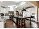 Spacious kitchen with granite island, stainless appliances, and skylights at 10605 Winterwood, Carmel, IN 46032