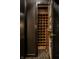 Close up of an open wooden wine cellar offering plenty of organized bottle storage at 10605 Winterwood, Carmel, IN 46032