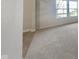 Neutral carpet with a view of a window and light at 10689 Brooks St, Indianapolis, IN 46234