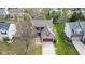 Charming two-story brick home with mature trees and a well-manicured lawn at 11347 Whitewater Way, Fishers, IN 46037