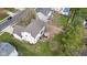 Aerial view of a home with a spacious backyard featuring a patio area and lush green lawn at 11347 Whitewater Way, Fishers, IN 46037