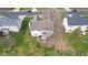 Aerial view of backyard with a charming patio and a well-maintained lawn at 11347 Whitewater Way, Fishers, IN 46037