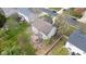Aerial view of a serene backyard featuring a patio area with lush landscaping and a privacy fence at 11347 Whitewater Way, Fishers, IN 46037