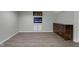 Finished basement area with an electric fireplace and stylish hardwood flooring at 11347 Whitewater Way, Fishers, IN 46037