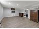 Large open area with plenty of space and a view into a bedroom at 11347 Whitewater Way, Fishers, IN 46037