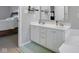 Bathroom featuring a double vanity with white cabinets, drawers, and fixtures at 11347 Whitewater Way, Fishers, IN 46037