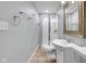 Well lit bathroom featuring a shower, toilet, and vanity sink with ample counter space at 11347 Whitewater Way, Fishers, IN 46037
