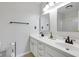 Bathroom featuring a shower, toilet, and a double vanity at 11347 Whitewater Way, Fishers, IN 46037