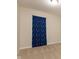Bedroom with carpet and a blue, space-themed curtain covering the window at 11617 Tahoe Way, Indianapolis, IN 46235