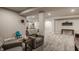 Finished basement space with comfortable seating and recessed lighting at 11880 Whisper Ridge Dr, Noblesville, IN 46060