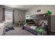 bedroom with a bunk bed and plenty of play space at 11880 Whisper Ridge Dr, Noblesville, IN 46060