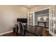 Bright home office, showcasing an open doorway to a modern entry, perfect for remote work at 11880 Whisper Ridge Dr, Noblesville, IN 46060