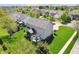 An aerial view showcases the property's backyard, featuring a screened porch and landscaped yard at 12088 Everwood Cir, Noblesville, IN 46060