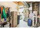 Utility area with water heater, HVAC system, storage and supplies at 12088 Everwood Cir, Noblesville, IN 46060