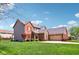 Beautiful brick home with well-kept lawn, featuring an attached garage and classic architectural details at 12088 Everwood Cir, Noblesville, IN 46060