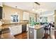 This kitchen has a functional island, stainless appliances, ample counter space, and an easy flow to living spaces at 12088 Everwood Cir, Noblesville, IN 46060