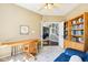 Bright and open office space with a view of the staircase, offering a tranquil work environment at 12088 Everwood Cir, Noblesville, IN 46060
