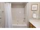 Well-maintained bathroom with a shower-tub combination and neutral decor, designed for relaxation and functionality at 12678 Brewton St, Fishers, IN 46038