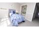 Playful bedroom with dinosaur theme, cozy bed, open closet, and soft carpeting, perfect for a imagination at 12678 Brewton St, Fishers, IN 46038