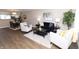 Cozy living room featuring stylish furniture and ample natural light at 12678 Brewton St, Fishers, IN 46038