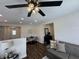 Open-concept living space with views to a dining area and entryway at 128 W Walnut St, Lebanon, IN 46052