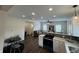 Open concept living space features updated kitchen with a view into the living room, great for entertaining guests at 128 W Walnut St, Lebanon, IN 46052