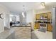 Well-appointed kitchen with breakfast bar, sleek countertops, and efficient stainless steel appliances at 12820 University Cres # 3D, Carmel, IN 46032