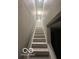 Neutral colored staircase at 137 S 2Nd Ave, Beech Grove, IN 46107