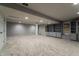 Spacious finished basement featuring neutral colored walls, recessed lighting, and carpeting at 13797 Mill Stream Ct, Carmel, IN 46032