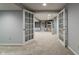 Finished basement featuring neutral walls, carpeted floors, recessed lights and paneled glass french doors at 13797 Mill Stream Ct, Carmel, IN 46032