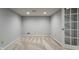 Finished basement room with neutral paint, recessed lighting, carpeted floors and glass panel door at 13797 Mill Stream Ct, Carmel, IN 46032