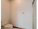 Powder room featuring a toilet and shower at 13797 Mill Stream Ct, Carmel, IN 46032