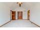 Spacious bedroom featuring neutral carpeting, multiple closets and vaulted ceilings at 13797 Mill Stream Ct, Carmel, IN 46032