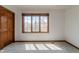 Carpeted bedroom with a closet and sunny window at 13797 Mill Stream Ct, Carmel, IN 46032
