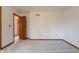Empty bedroom with carpet and an open doorway at 13797 Mill Stream Ct, Carmel, IN 46032