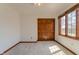 Comfortable carpeted bedroom with closet and a window at 13797 Mill Stream Ct, Carmel, IN 46032