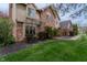 Charming two-story home with a manicured lawn, mature trees, and inviting curb appeal at 13797 Mill Stream Ct, Carmel, IN 46032