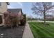 Well-maintained sidewalk leads to a lovely home with vibrant landscaping and mature trees at 13797 Mill Stream Ct, Carmel, IN 46032