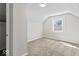 Bedroom featuring a new carpet, window with a view, and neutral color palette at 1409 S Kiel Ave, Indianapolis, IN 46241