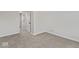 Spacious bedroom with new carpeting, ample natural light, and a neutral color palette at 1409 S Kiel Ave, Indianapolis, IN 46241